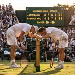 Exhausted players John Isner and Nicolas Mahut during the longest tennis match in history at Wimbledon