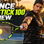 Male tennis player hitting a heavy topspin forehand with the Prince Ripstick 100 tennis racket on a hard court.
